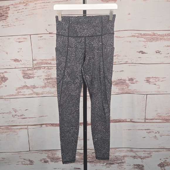 Athleta Salutation Stash Pocket Tight Black Print Size Small - Picture 1 of 6